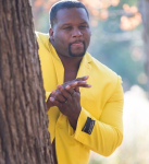 black-guy-hiding-behind-tree.png